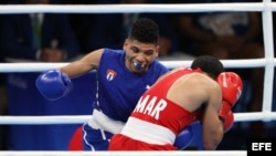 El boxeador cubano Yosvany Veitía (a la izquierda) en su combate contra el marroquí Kharroubi.